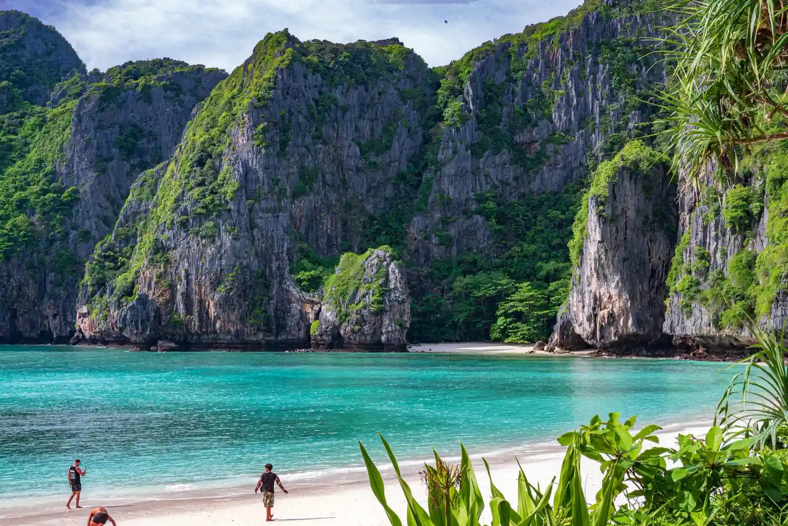 Boats along a beach in the Phi Phi islands, Thailand